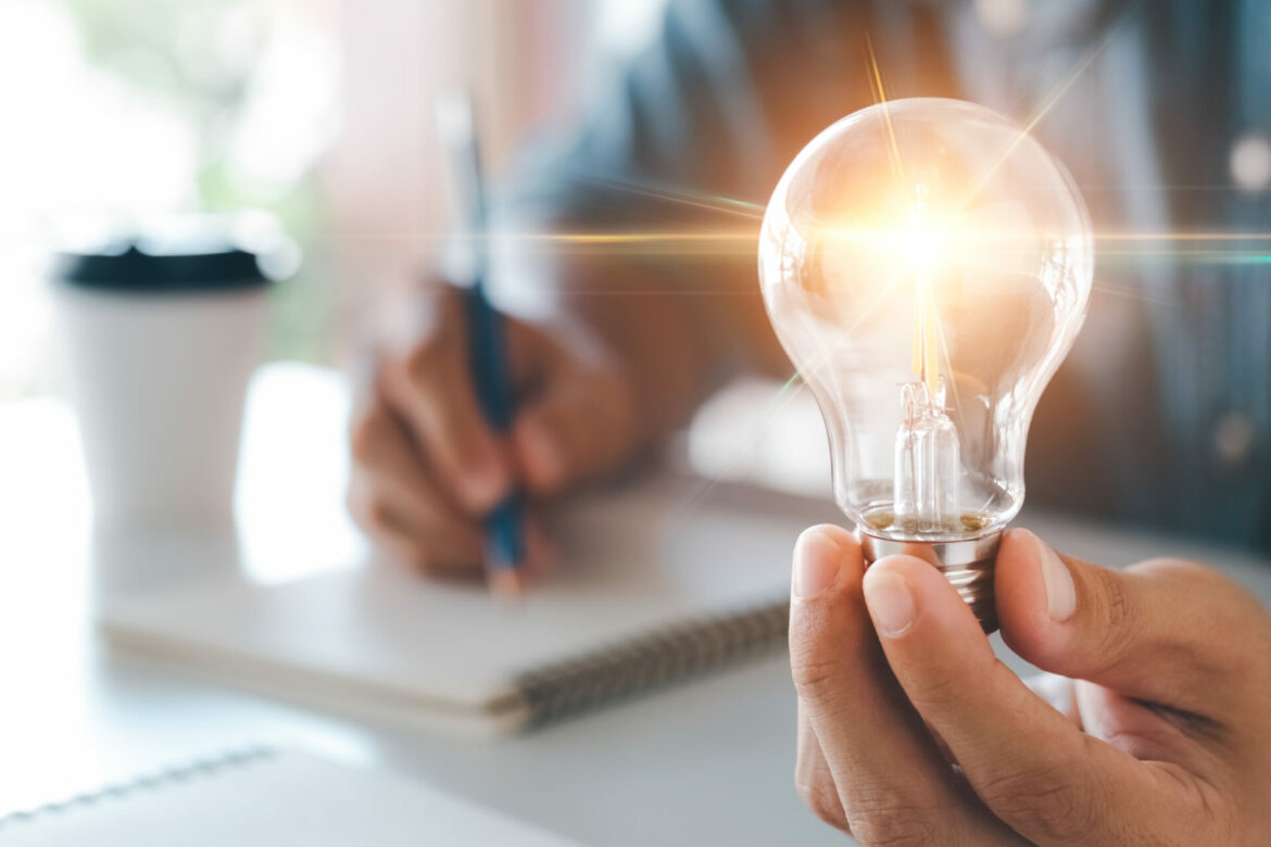 innovation-through-ideas-and-inspiration-ideas-human-hand-holding-light-bulb-to-illuminate-idea-of-creativity-and-inspiration-concept-of-sustainable-business-development-stockpack-istock.jpg
